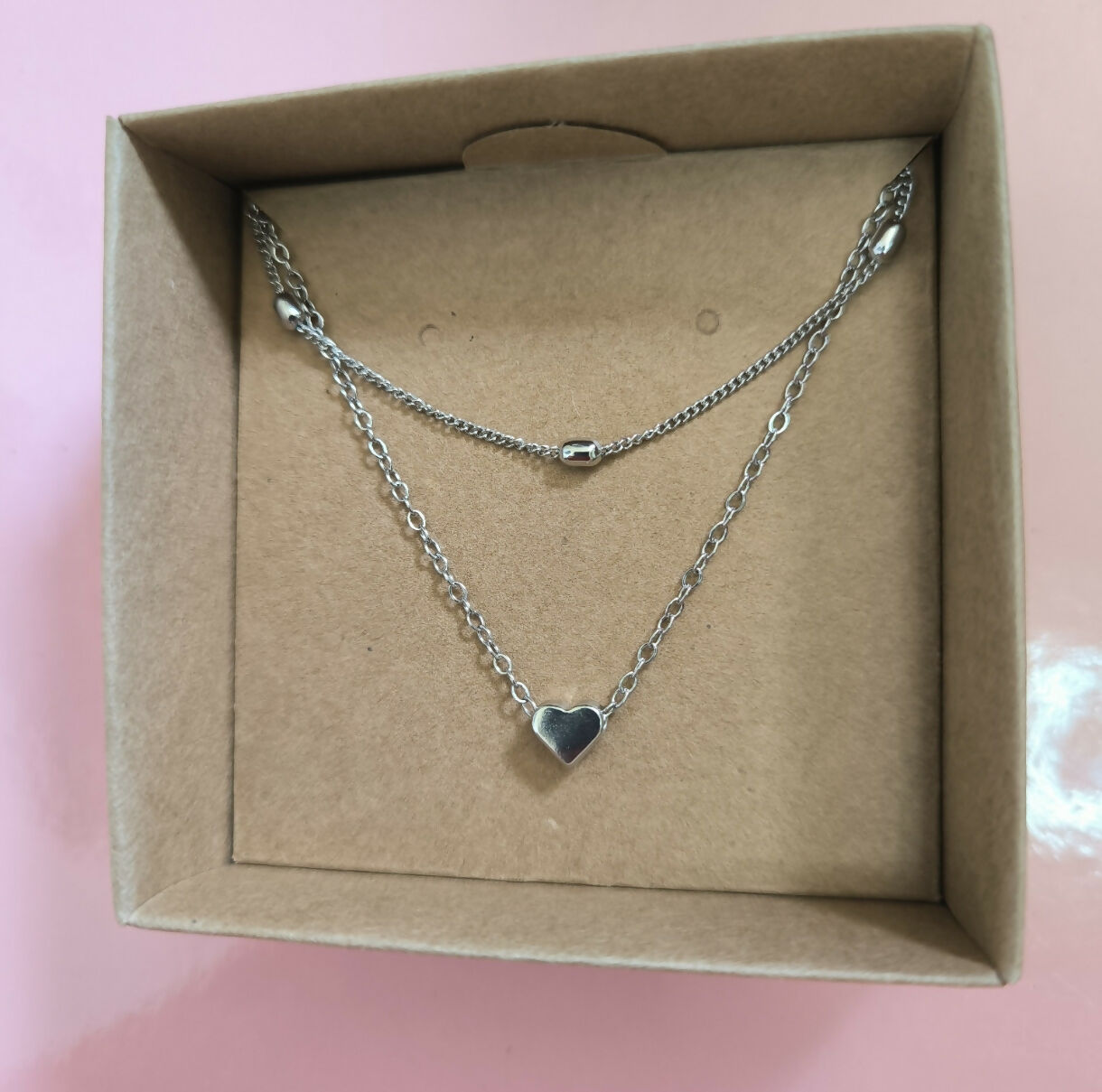 Collar Doble con Corazón en Acero Plateado